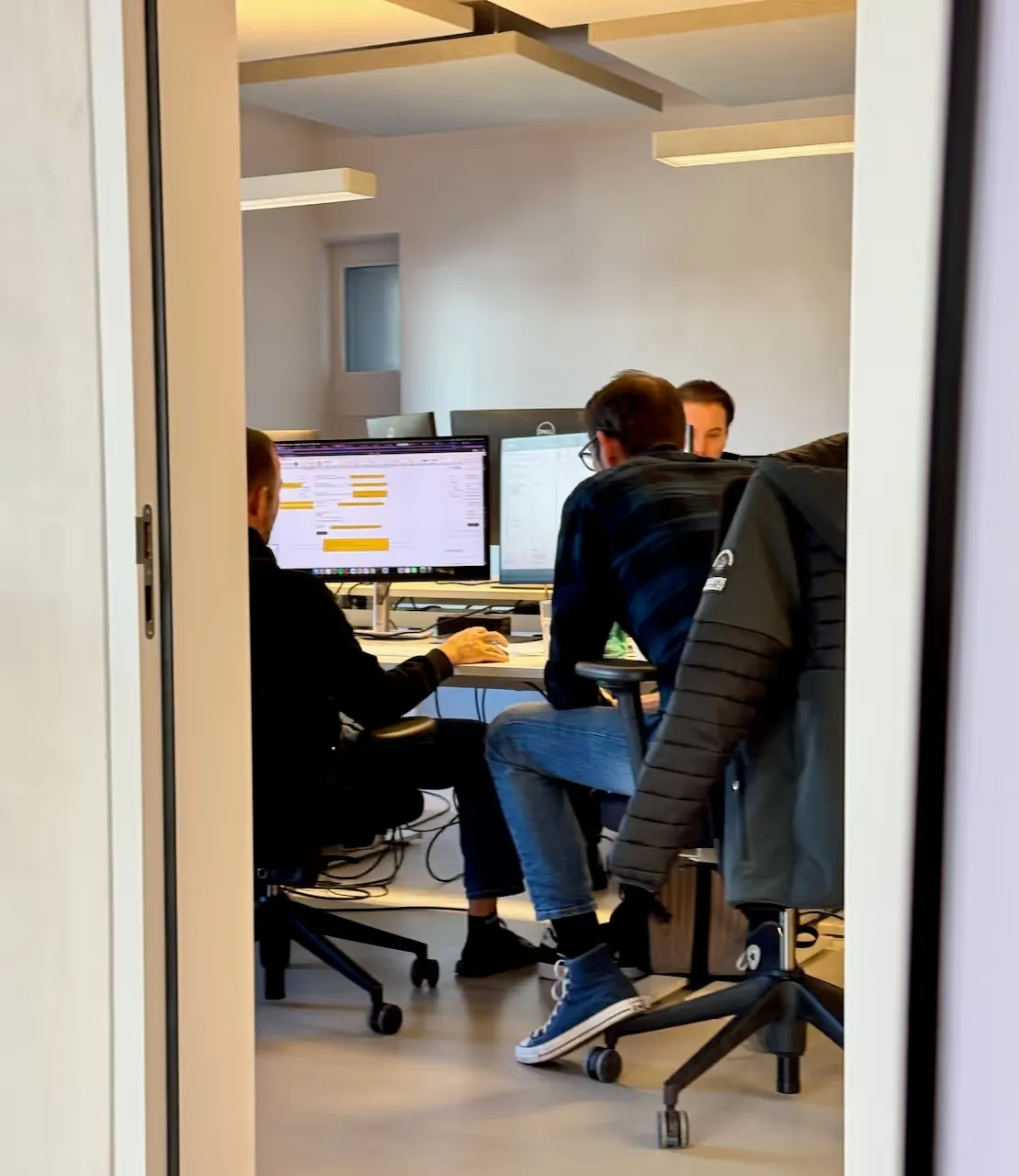The Paymira team at work in the office